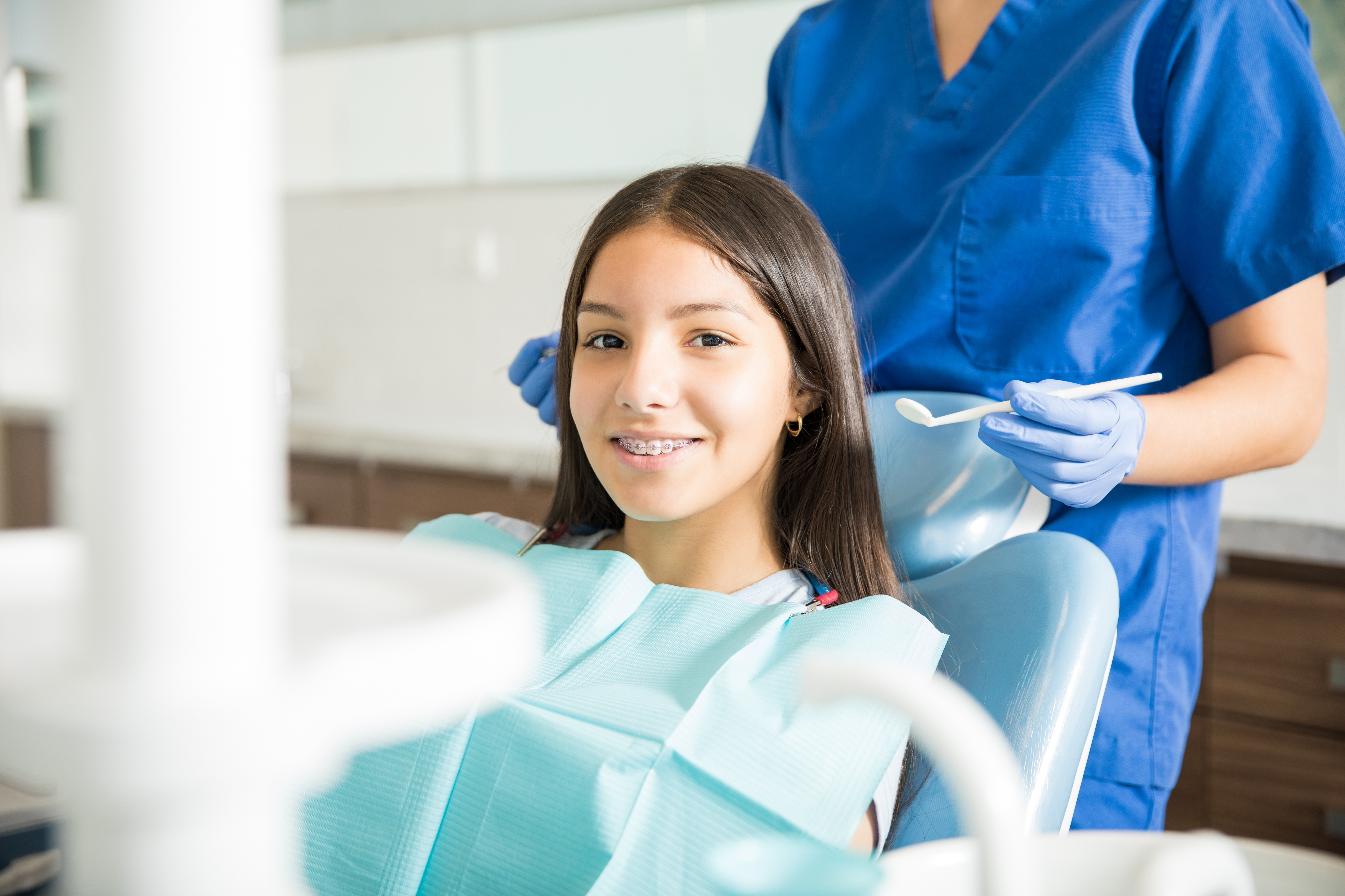 <a href="https://www.freepik.com/free-photo/portrait-smiling-teenage-girl-with-braces-sitting-chair-while-dentist-standing-clinic_28030839.htm#fromView=search&page=1&position=38&uuid=c8c64622-758f-4e1e-9c1d-54c553c4eb71&query=orthodontic+dentist+smile">Image by tonodiaz on Freepik</a>
