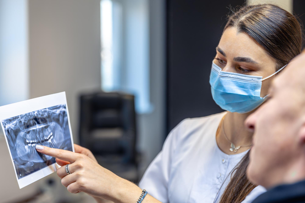 <a href="https://www.magnific.com/free-photo/young-female-dentist-showing-patient-dental-xray-dentistry-concept_417294029.htm#fromView=search&page=1&position=27&uuid=d14b3045-b960-4f3f-8c2e-0410f12796d3&track=ais_hybrid&query=dentist+reviewing+dental+xray">Image by pvproductions on Magnific</a>