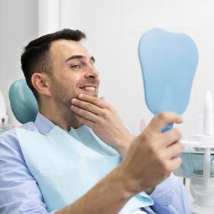 <a href="https://www.freepik.com/free-photo/close-up-happy-client-dental-clinic_21085416.htm#fromView=search&page=1&position=6&uuid=c06cd99b-02ee-494e-8c3c-767b957e9cb2&query=dentist+implant">Image by freepik</a>